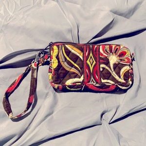 Vera Bradley Wristlet with brown background.